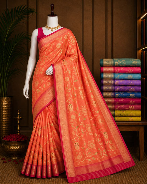 Coral orange boutique saree with woven floral vines and magenta gold-tone border