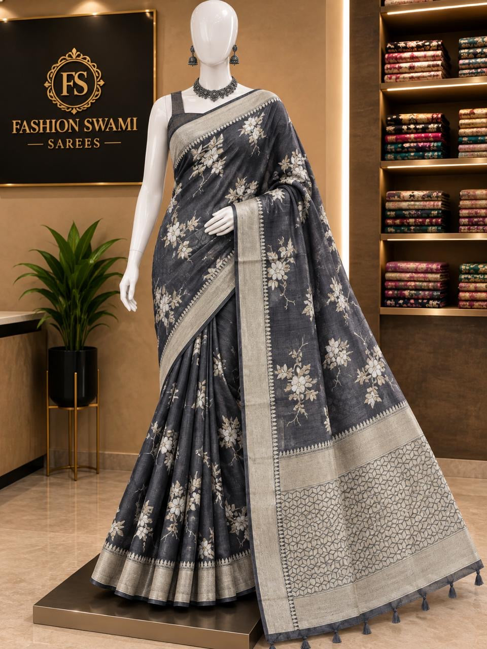 Charcoal grey party wear saree with ivory floral sprays and geometric pallu