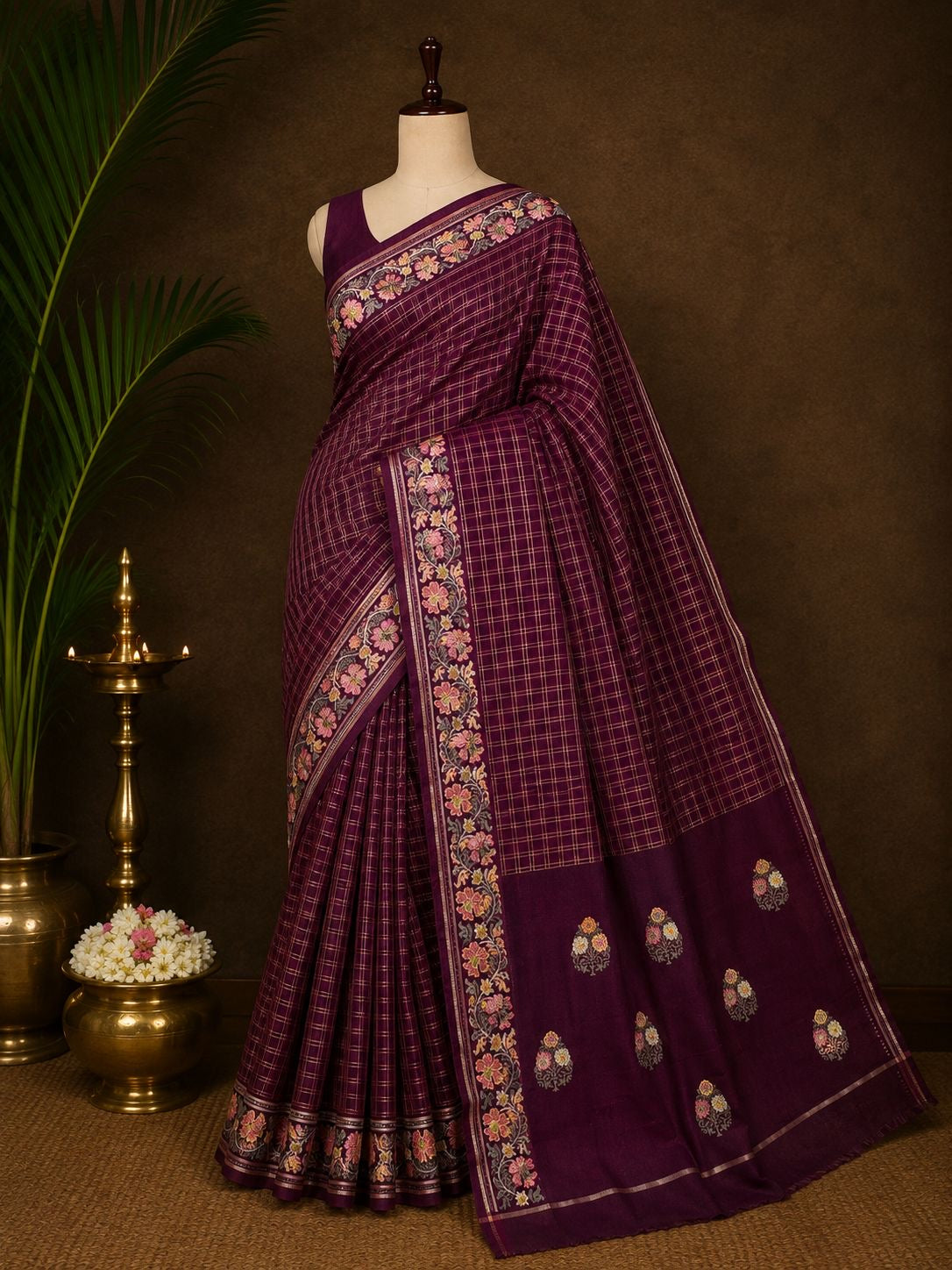 Deep plum checked party wear saree with embroidered floral border
