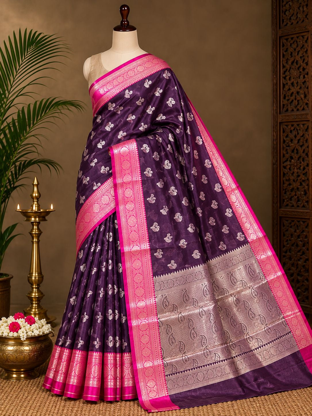 Deep purple Banarasi saree with rani pink border and silver zari buti