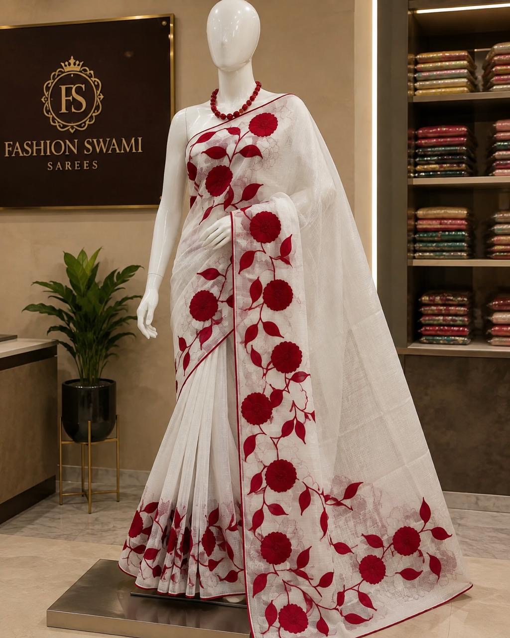 Ivory party wear saree with bold crimson floral vines and matching border