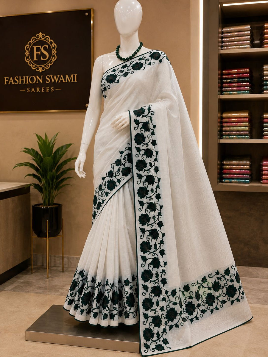 Ivory party wear saree with deep emerald floral vine border