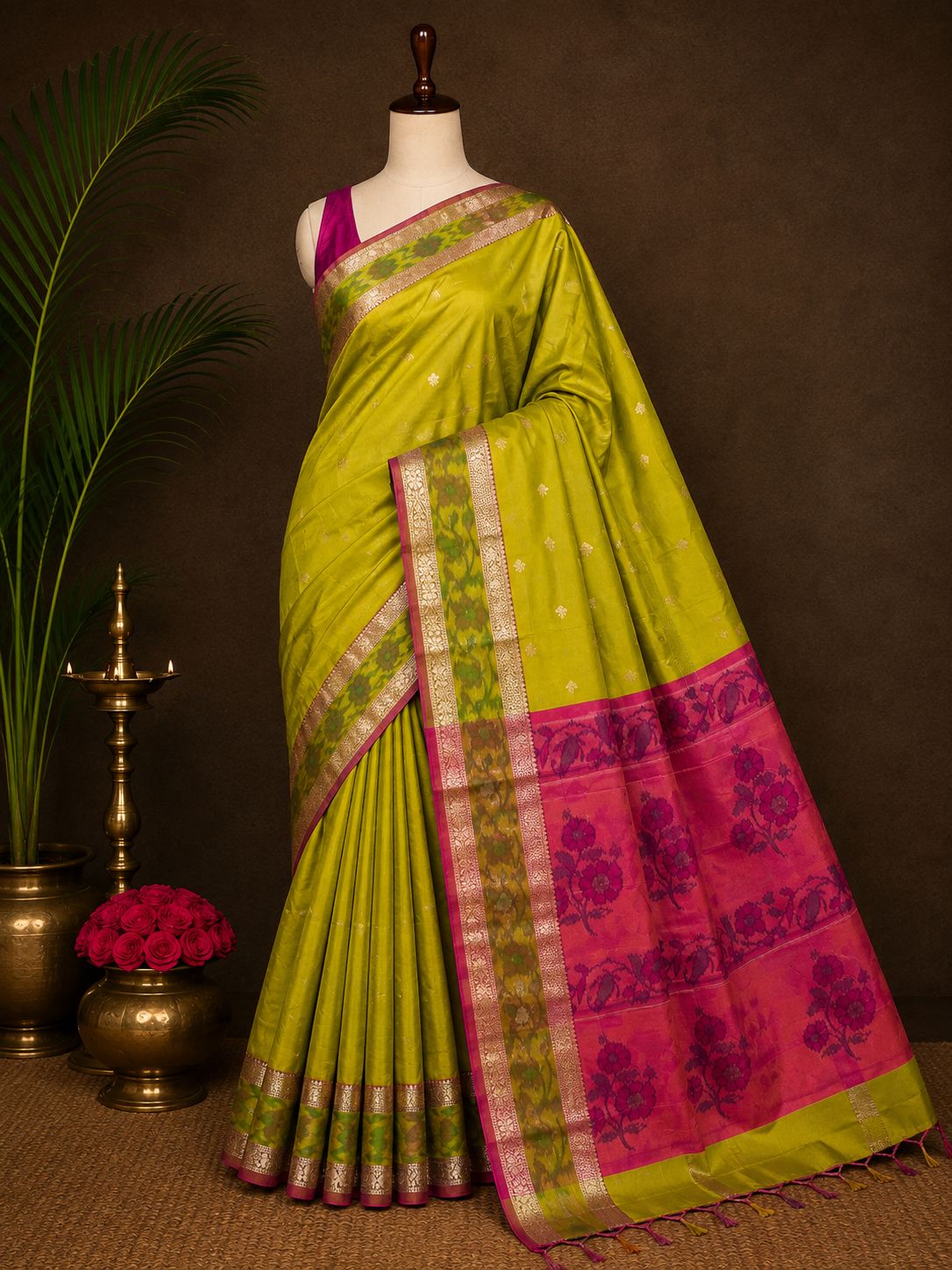 Lime green party wear saree with pink floral pallu and woven border