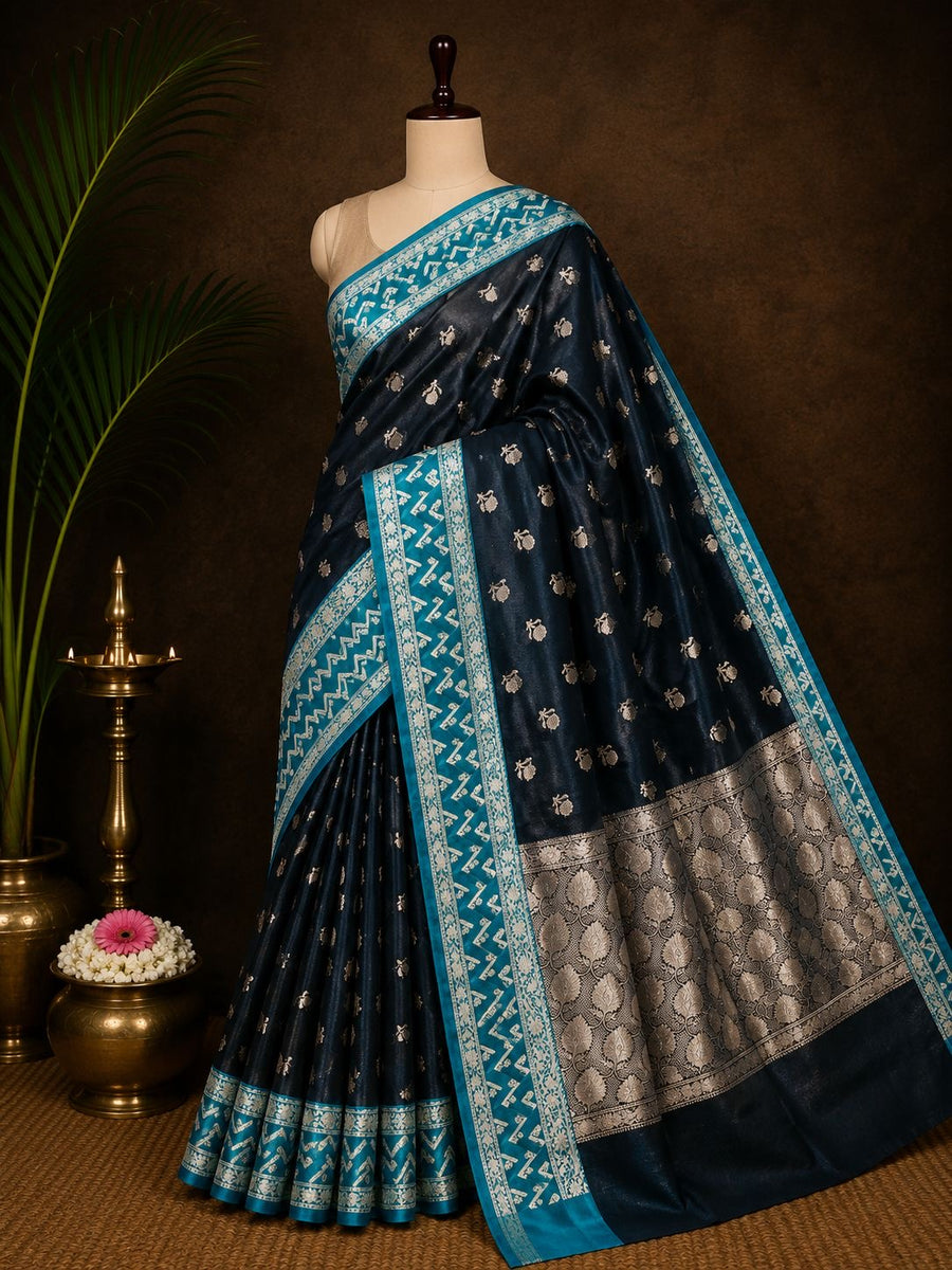 Midnight navy Banarasi saree with turquoise border and silver zari motifs