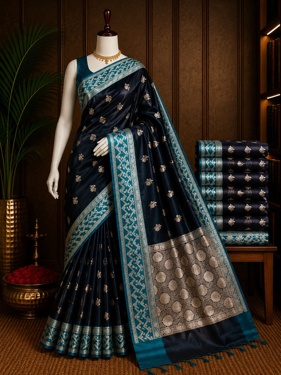 Midnight black party wear saree with teal border and silver floral pallu