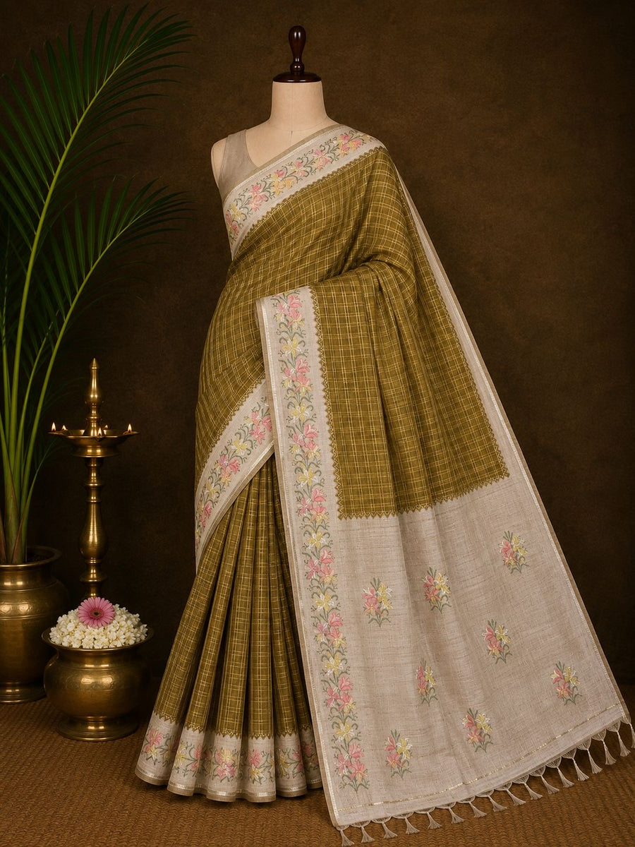 Olive checked party wear saree with beige floral border in studio look