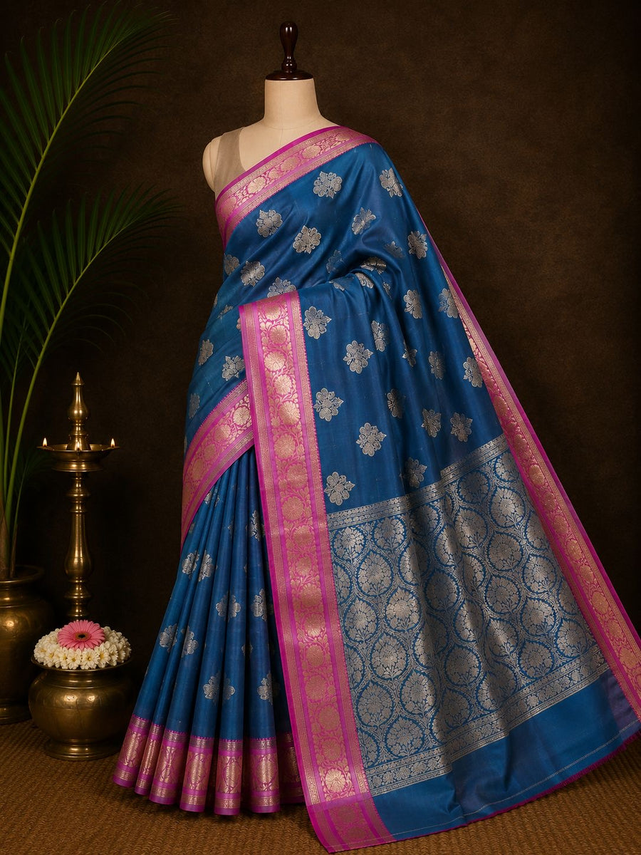 Peacock blue Banarasi saree with magenta border and silver zari work