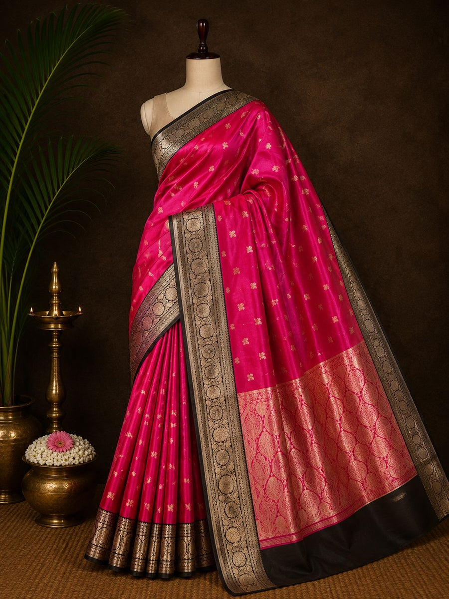 Rani pink Banarasi saree with black border and metallic zari work